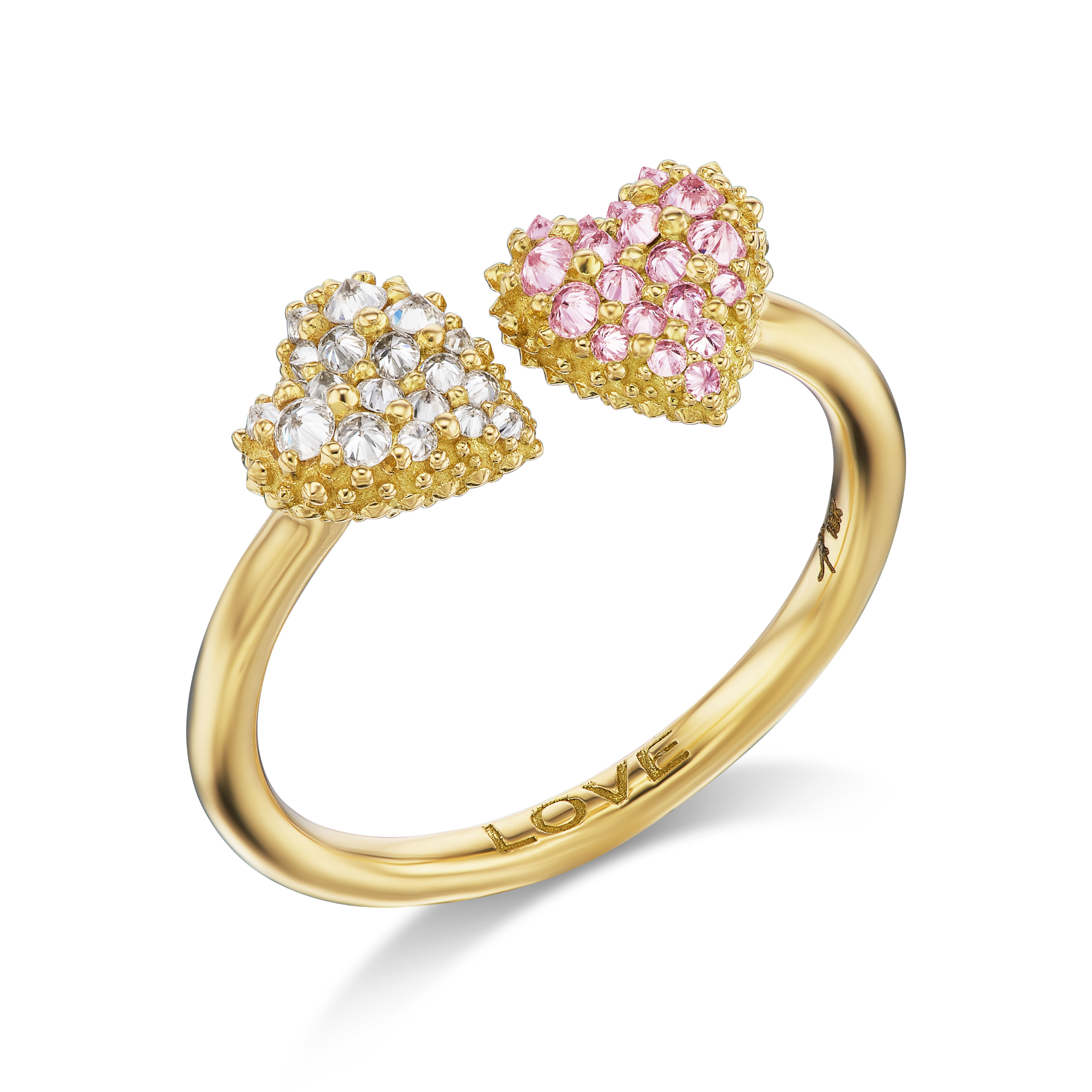 An 18k yellow gold Diamond & Pink Sapphire ring with two spiked hearts side by side for a new spin on the classic 'moi et toi' design. The word 'love' is shown engraved inside the band of the ring designed by Ana-Katarina fine jewelry.