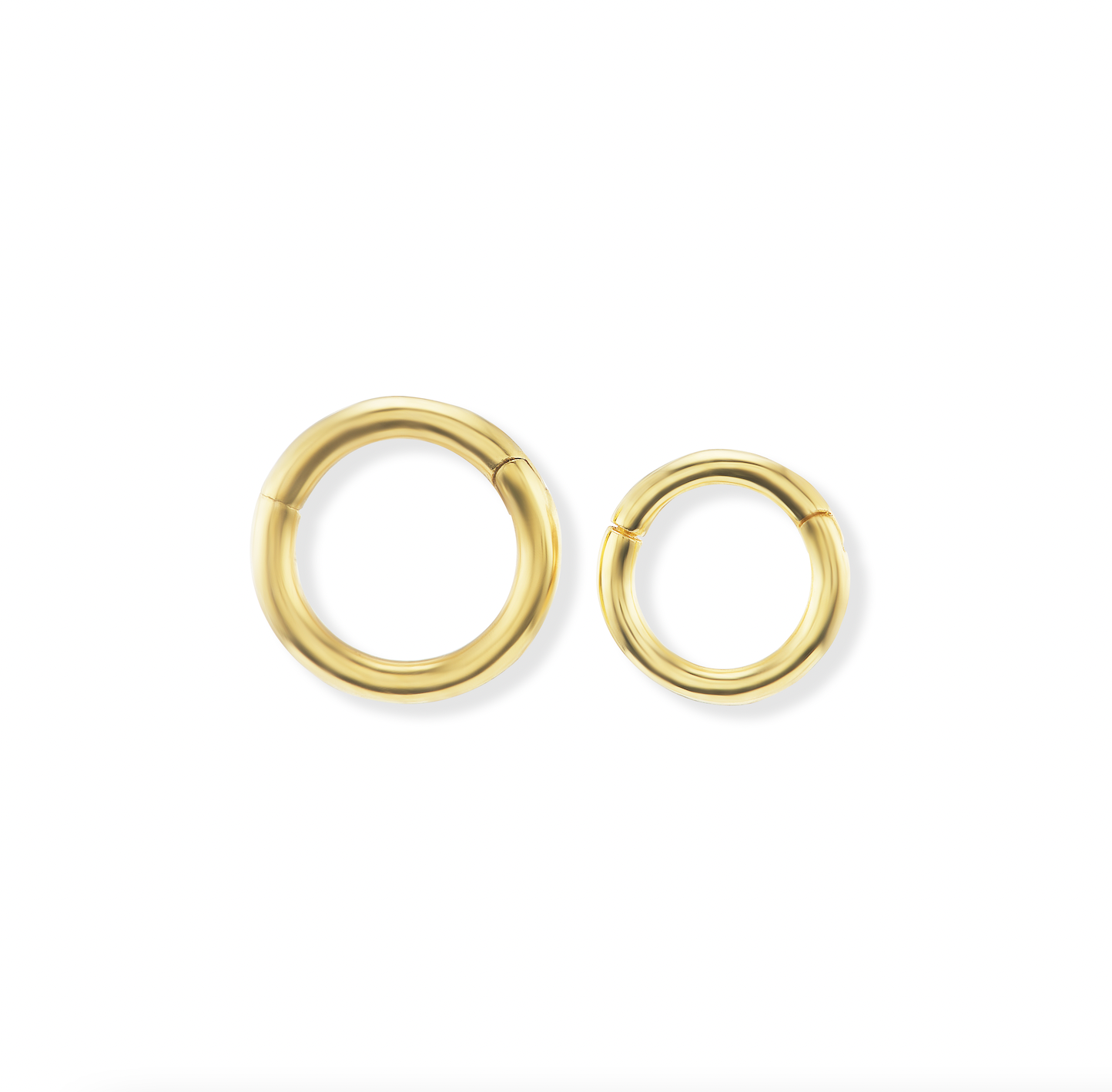 Two 18k yellow gold, link-style charm holders in two sizes: 12mm large and 10mm small links. They open ‘carabiner-style’ to accommodate additional charms and pendants to create a gold necklace out of any gold chain. Designed by Ana-Katarina Fine Jewelry.