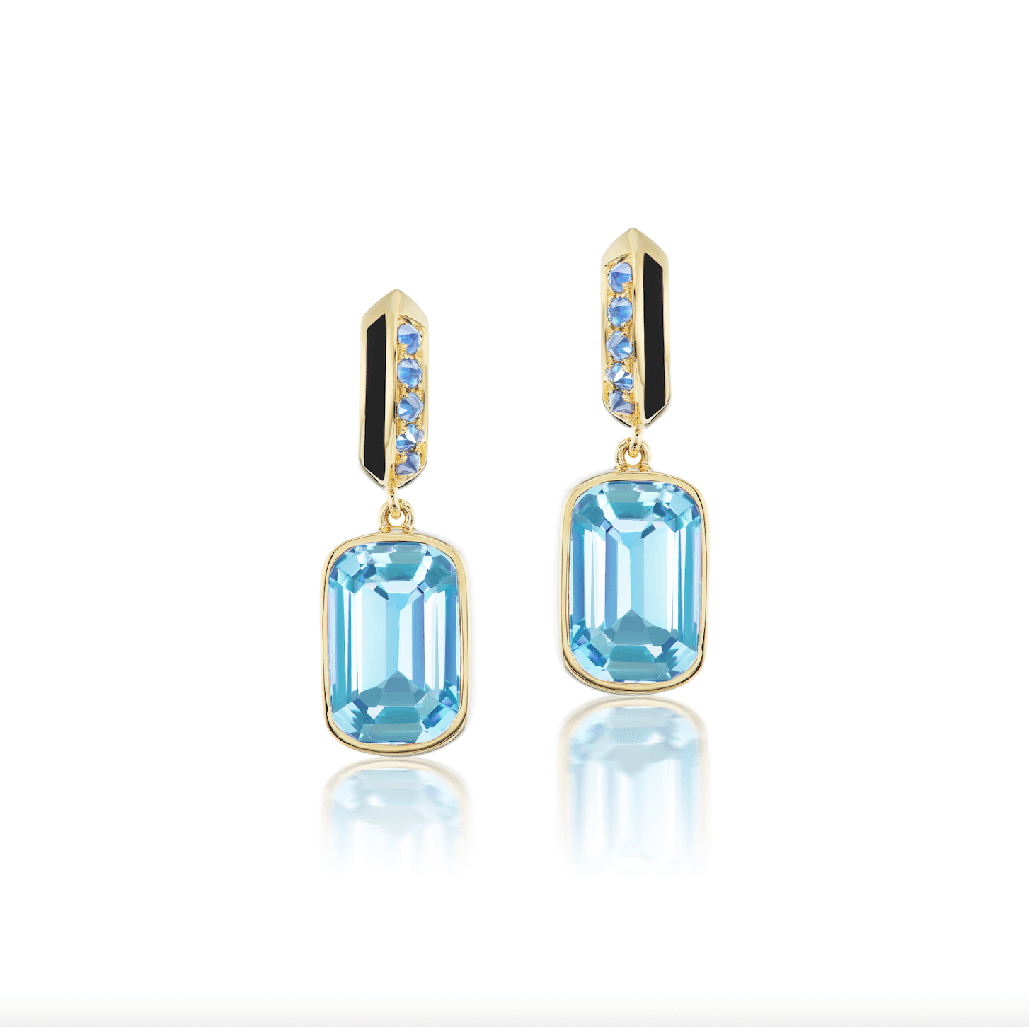 A front view of the exquisite 'Sweet, Happy Life' Blue Topaz Drop Earrings meticulously crafted by AnaKatarina with a blue topaz drop, 18k yellow gold spikes, and embellished with .48ct inverted blue sapphires and black enamel for a touch of sophistication. Designed by Ana-Katarine Fine Jewelry.