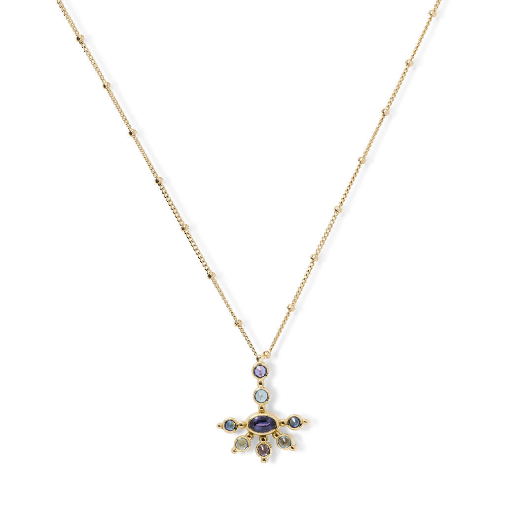 AnaKatarina Purple Haze Mini Funny Valentine pendant with purple and blue sapphires and aquamarines in yellow gold on an AK Saturn chain.