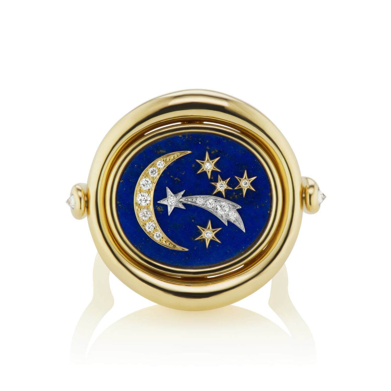 Top-down view of a gold and blue lapis ring with stars and moon. 18k Yellow and White Gold, Chilean Lapis, and .31ct Diamonds designed by Ana-Katarina.