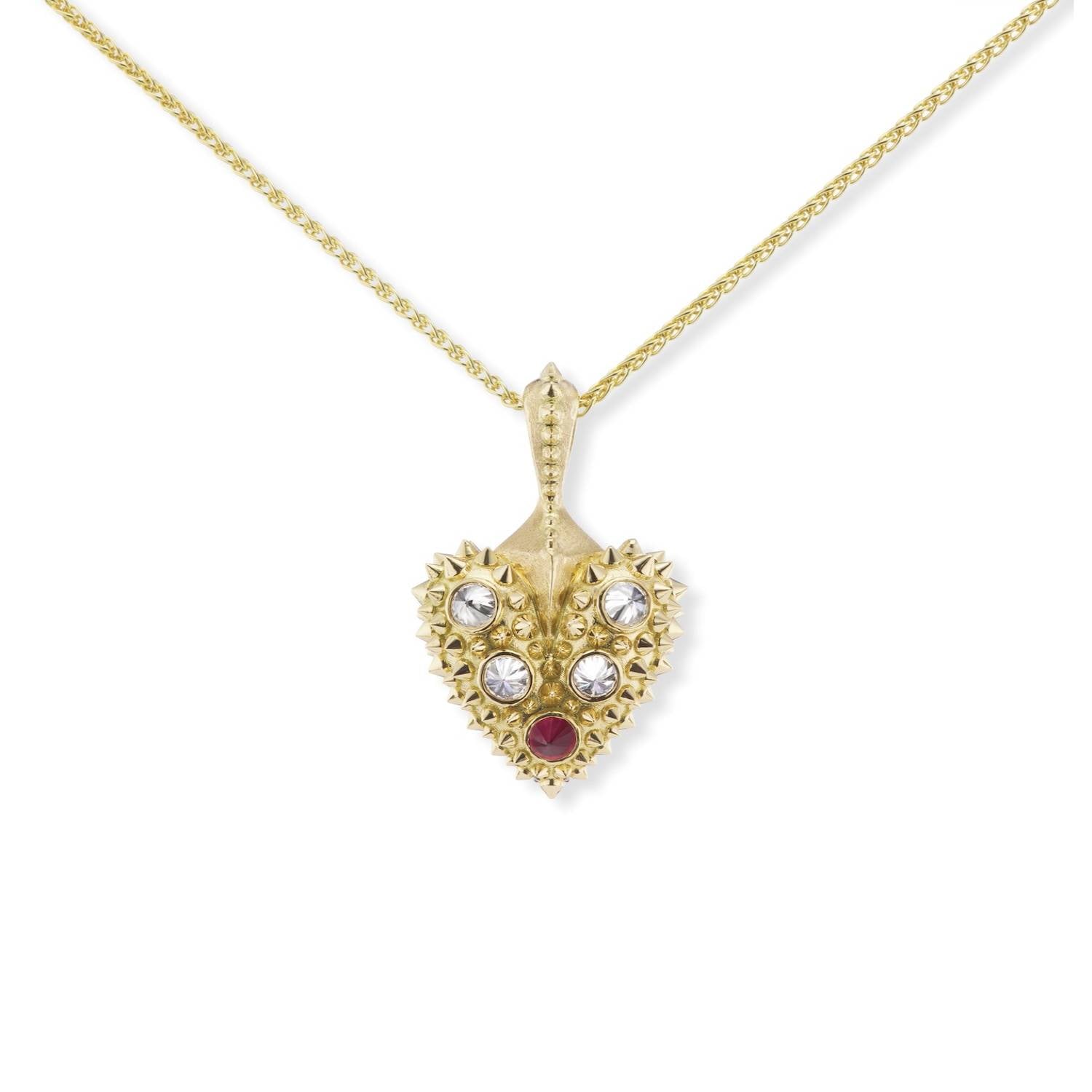A large 18k yellow gold heart necklace with soft spikes & inverted diamonds & rubies on a gold chain - designed by Ana-Katarina fine jewelry.