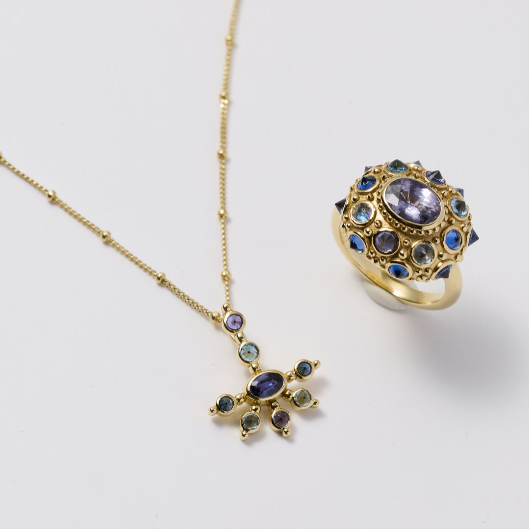 AnaKatarina Purple Haze ring and Mini Funny Valentine pendant with purple and blue sapphires and aquamarines in 18k yellow gold.