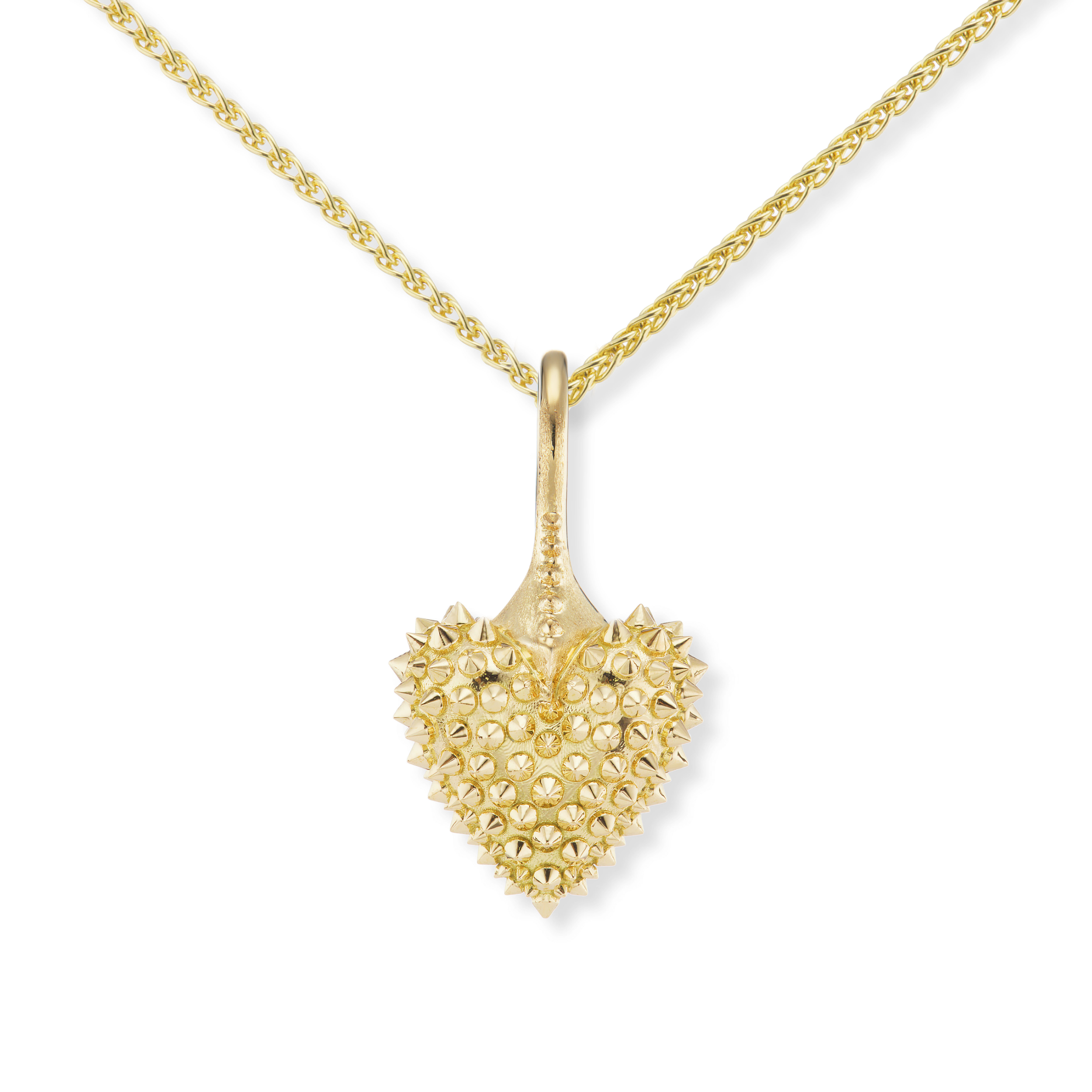An 18k yellow gold mini heart necklace with soft spikes - designed by Ana-Katarina fine jewelry. 