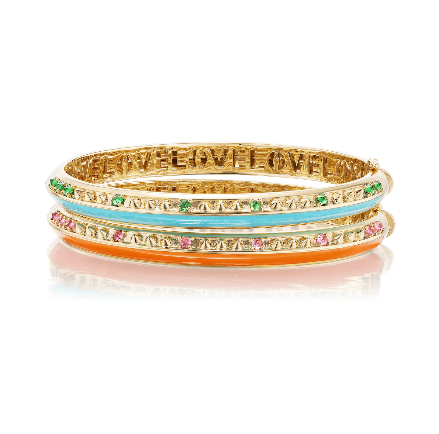 Another side view of two bangle bracelets designed by AnaKatarina Fine Jewelry stacked together. Both are crafted from 18k yellow gold. One is the 'Sweet, Happy Life' Tsavorite Garnet Bangle crafted from 18k Yellow Gold and embellished with .48tw Tsavorite Garnets and turquoise enamel. 