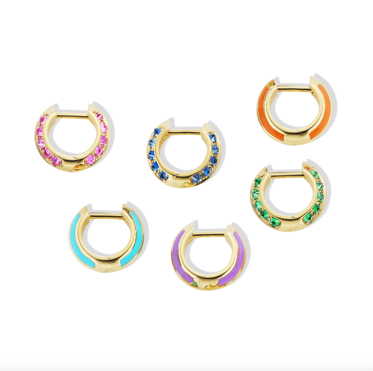 Three sets of luxurious 18K yellow gold Huggie earrings from the 'Sweet, Happy Life' fine jewelry collection, displaying a rainbow set in colorful precious jewels and smooth enamel. All three pairs are shown on their side against a white background to show both sides of the earrings - designed by  Ana-Katarina Fine Jewelry. 