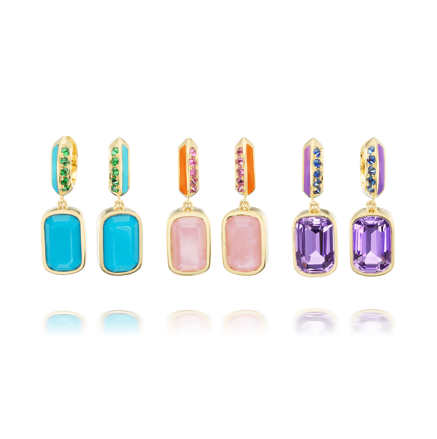 A frontal view of three pairs of luxurious drop earrings from AnaKatarina's 'Sweet, Happy Life' collection. From left to right: 'Sweet, Happy Life' Tsavorite Garnet Drop Earrings in 18k yellow gold and embellished with fine gems. 