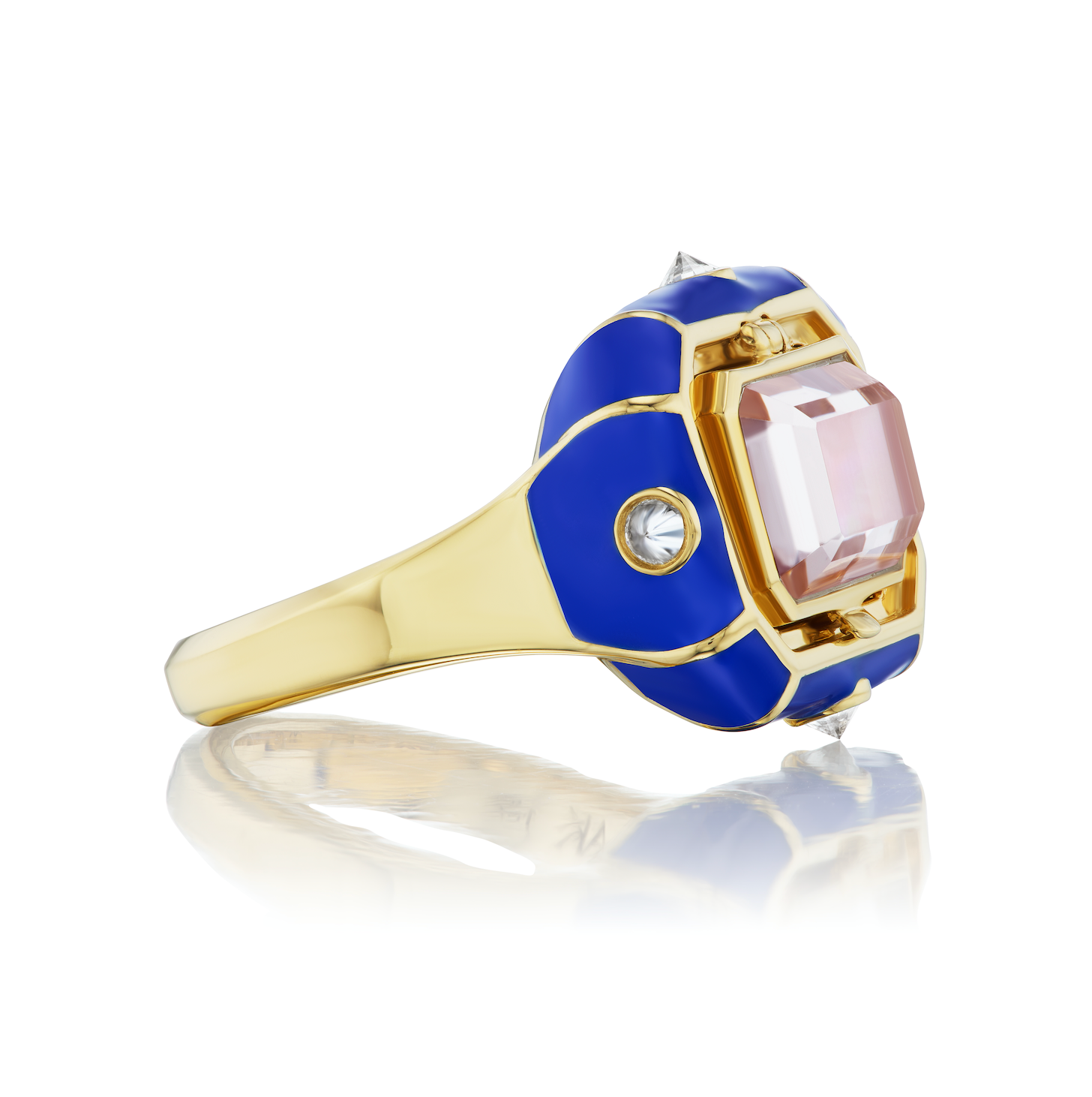 A side view of AnaKatarina's 'Pretty Little Secrets' Ring - a luxurious pink mother of pearl ring with 18K yellow gold accents, featuring a secret compartment to cherish precious memories. Exquisitely crafted of 18k yellow gold, .19ct Diamonds, Pink Mothe
