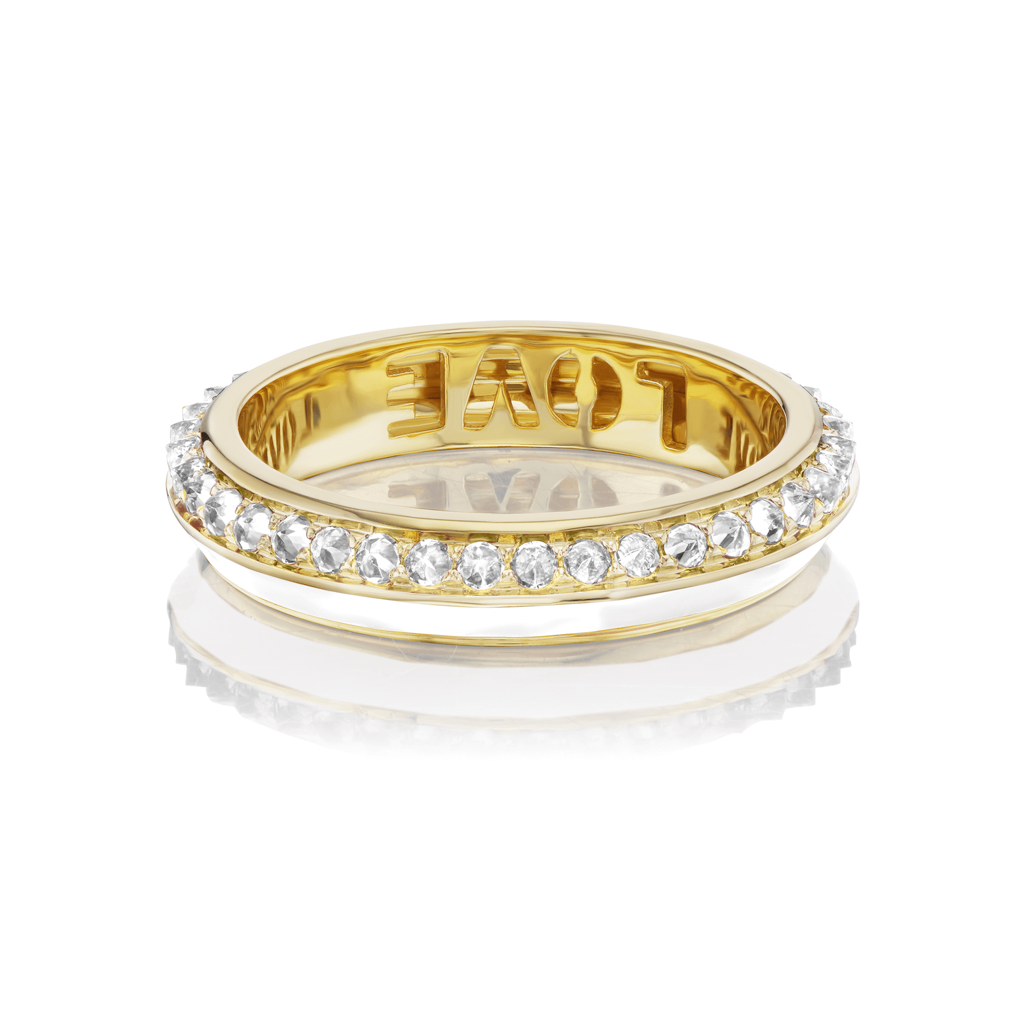 The side view of AnaKatarina's 'Sweet, Happy Life' Stacking Diamond Ring in 18k yellow gold, embellished with a mesmerizing .60ct diamond and in pristine white enamel- the word "love" is engraved in gold inside.