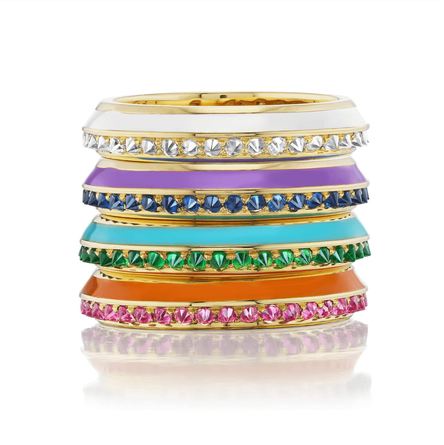 Four of AnaKatarina's 'Sweet, Happy Life' line of Stacking Rings: 'Sweet, Happy Life' Stacking Diamond Ring in 18k yellow gold, embellished with mesmerizing .60ct diamonds and in pristine white enamel, the 'Sweet, Happy Life' Blue Sapphire Stacking Ring w