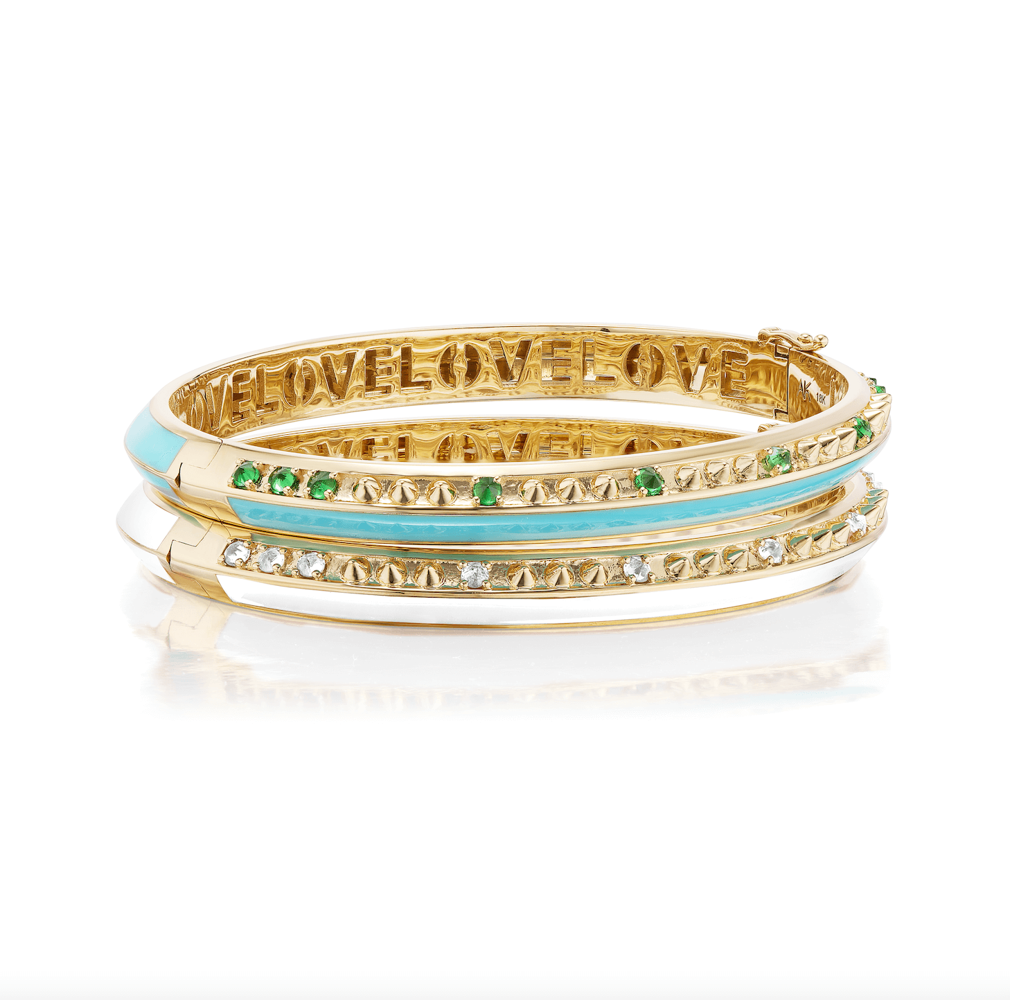 A side view of AnaKatarina's stunning 'Sweet, Happy Life' Drop Diamond Bangle. Crafted with 18k yellow gold, .50tw diamonds, and white enamel - stacked with her 'Sweet, Happy Life' Tsavorite Garnet Bangle featuring the words "love" in gold enamel, crafted from 18k Yellow Gold and embellished with .48tw Tsavorite Garnet and Turquoise Enamel. Designed by Ana-Katarina Fine Jewelry.