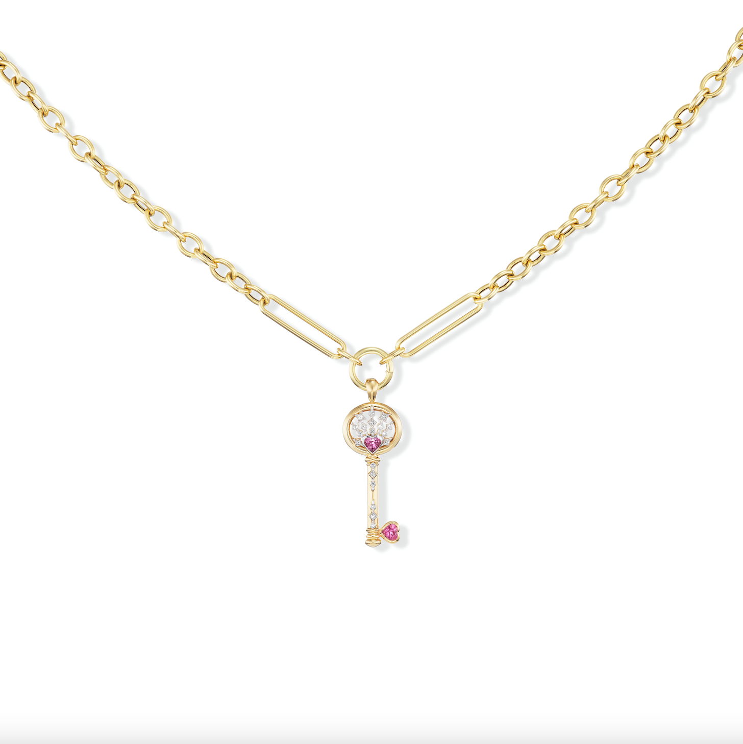 AK's Impeccable Words: 'Love' Key Pendant in 18k yellow gold with two pink tourmaline hearts and diamonds shown on the 18k yellow gold Olivia Chain against a white background. 