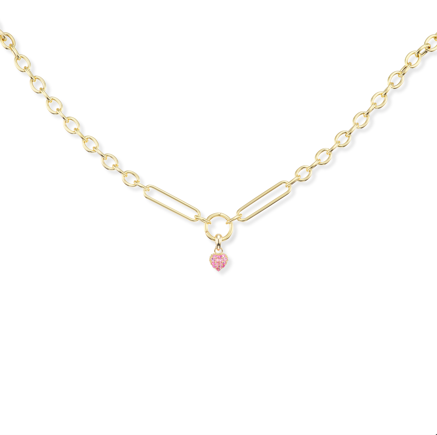 The ‘Pierce Your Heart’ pink sapphire heart charmlette pendant shown on an 18k yellow gold Olivia Chain both designed by Ana-Katarina Fine Jewelry. 
