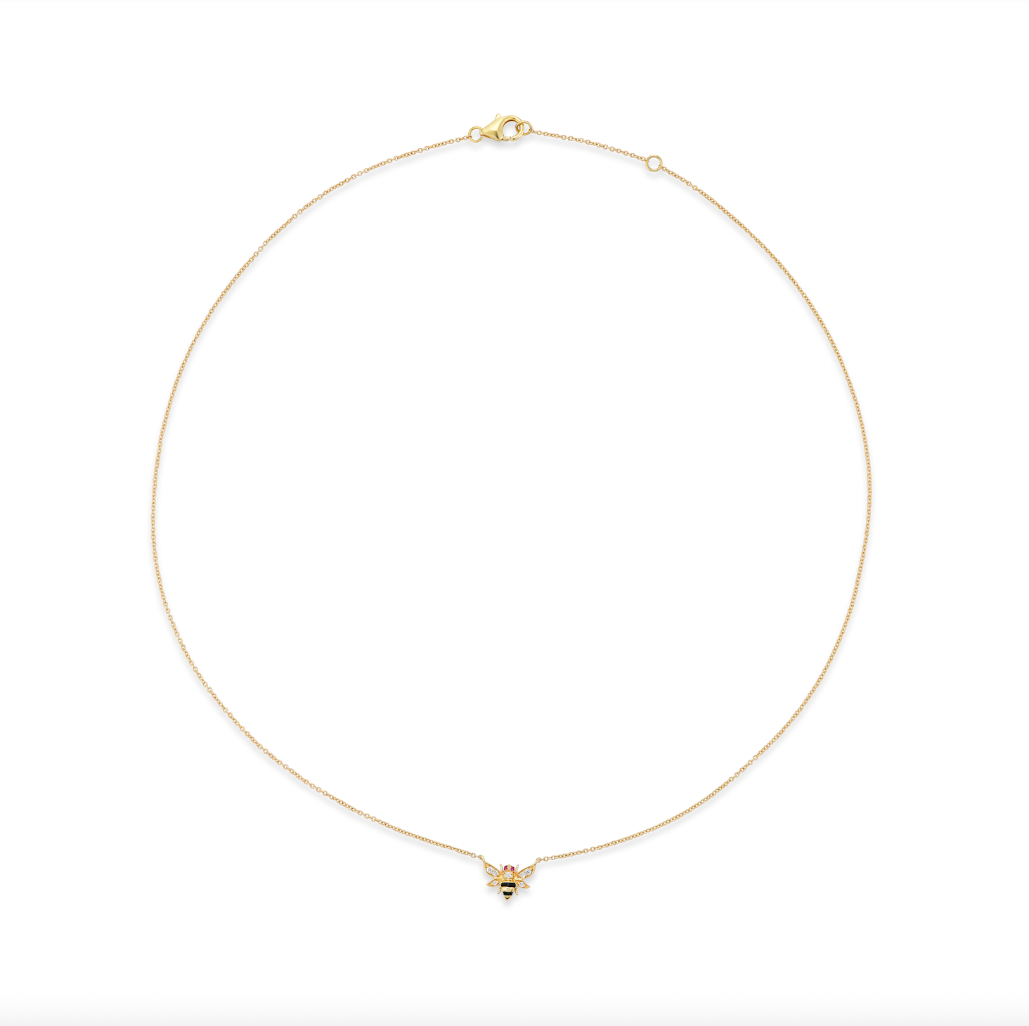 A Bee Charm Necklace: laid out flat and expertly designed and crafted in 18k yellow gold with diamond wings, ruby eyes, and black enamel and gold stripes on a gold chain. Designed by Ana-Katarina Fine Jewelry. 
