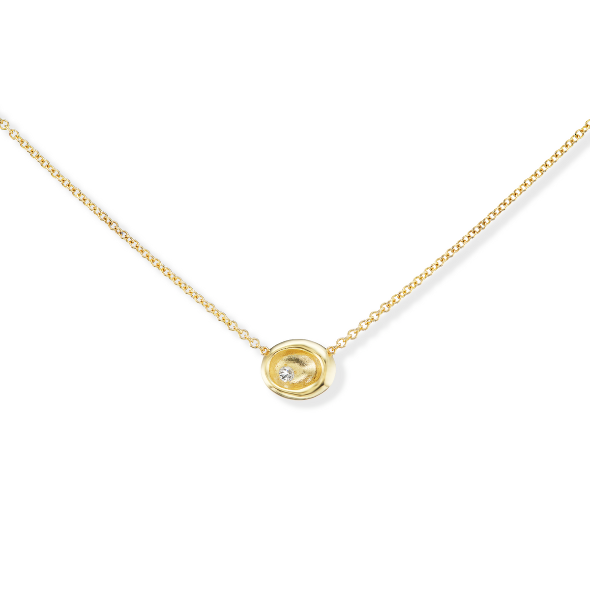 Front view of AnaKatarina’s Pebble necklace in 18k yellow gold with an inverted-set diamond on a slider chain.