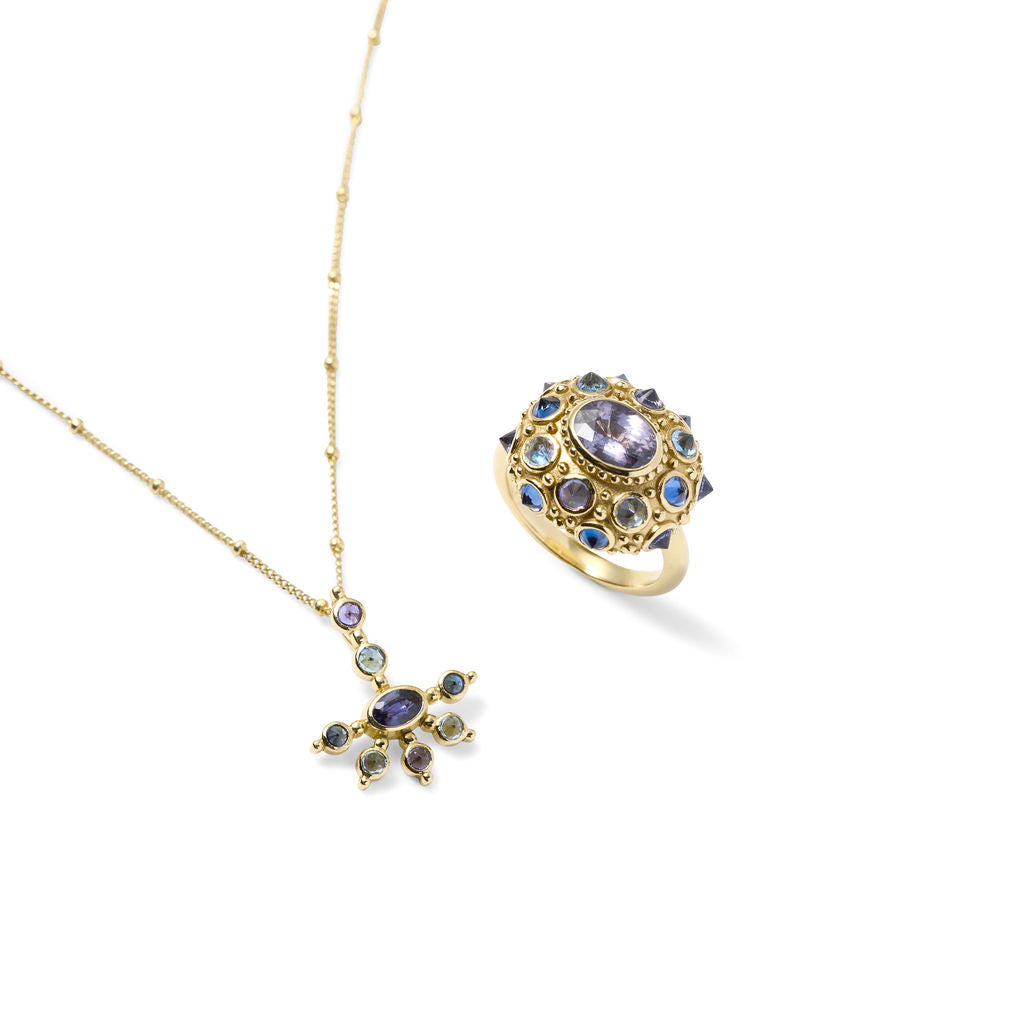 AnaKatarina Purple Haze ring and Mini Funny Valentine pendant with purple and blue sapphires and aquamarines in 18k yellow gold.