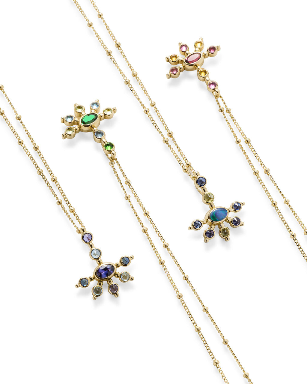 AnaKatarina Mini Funny Valentine necklaces displayed together, featuring colorful gemstones and sea urchin-inspired gold designs.