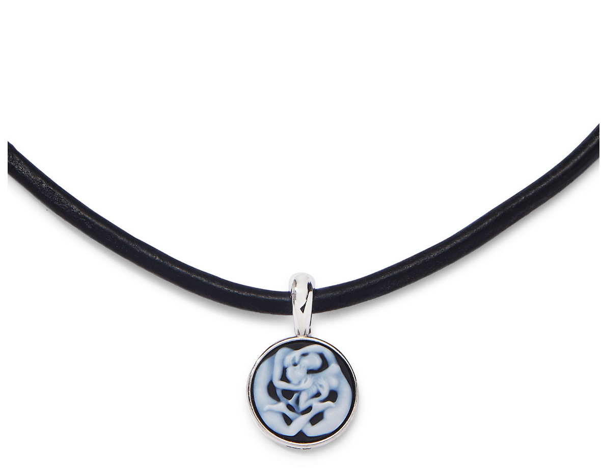 Hand-carved Eros agate cameo framed in luminous platinum
