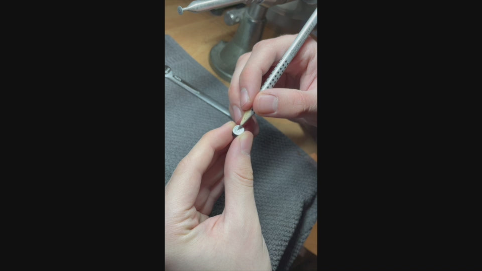 A video of a master jewelry crafter carving an eye into blue agate in the creation of one of Ana-Katarina's ‘Eye Love’ Gold & Diamond Necklaces. 