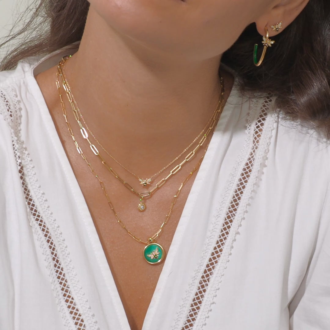 A video of a model wearing all four necklaces from Ana-Katarina’s ‘4 Elements’ collection, as well as stud earrings from Ana-Katarina fine jewelry. 