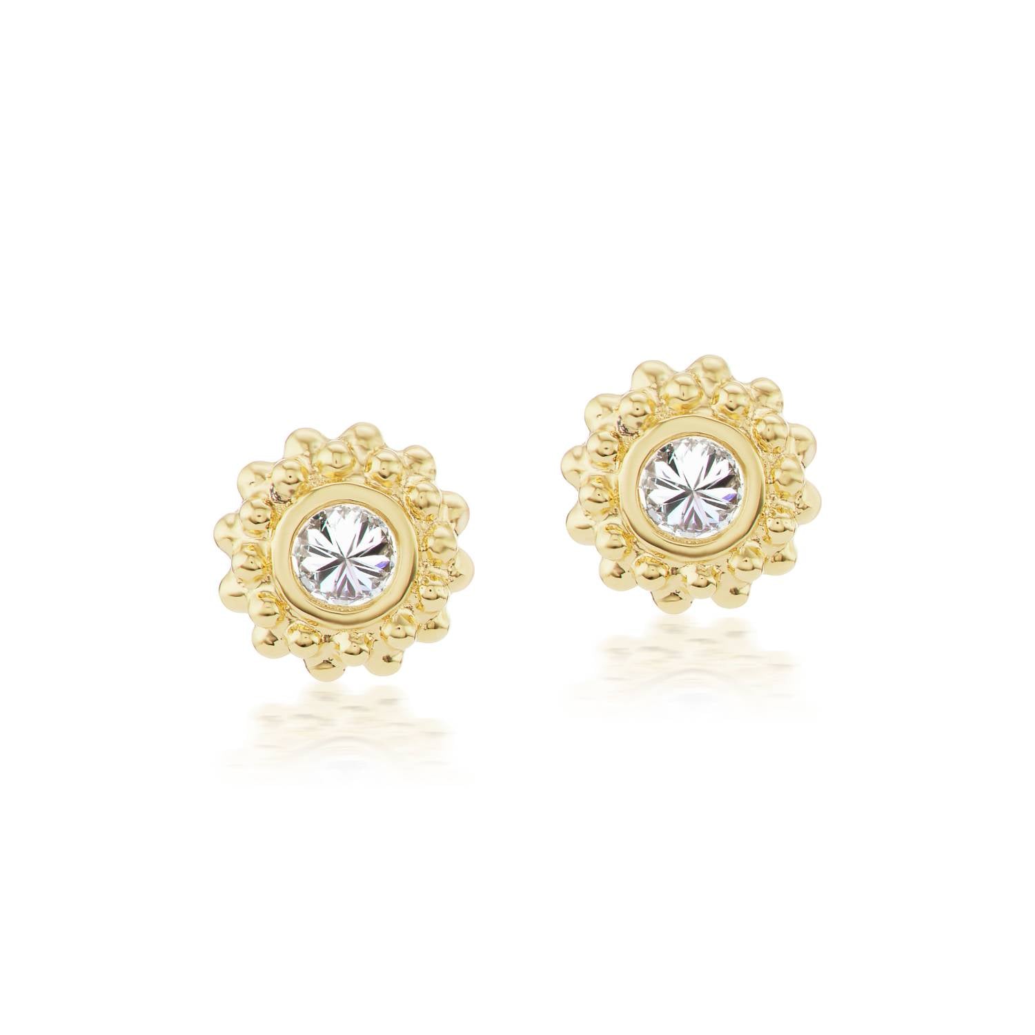 A set of 18k yellow gold and inverted diamond stud earrings with soft gold beading in the setting designed after the delicate design of a sea urchin by Ana-Katarina Fine Jewelry. 