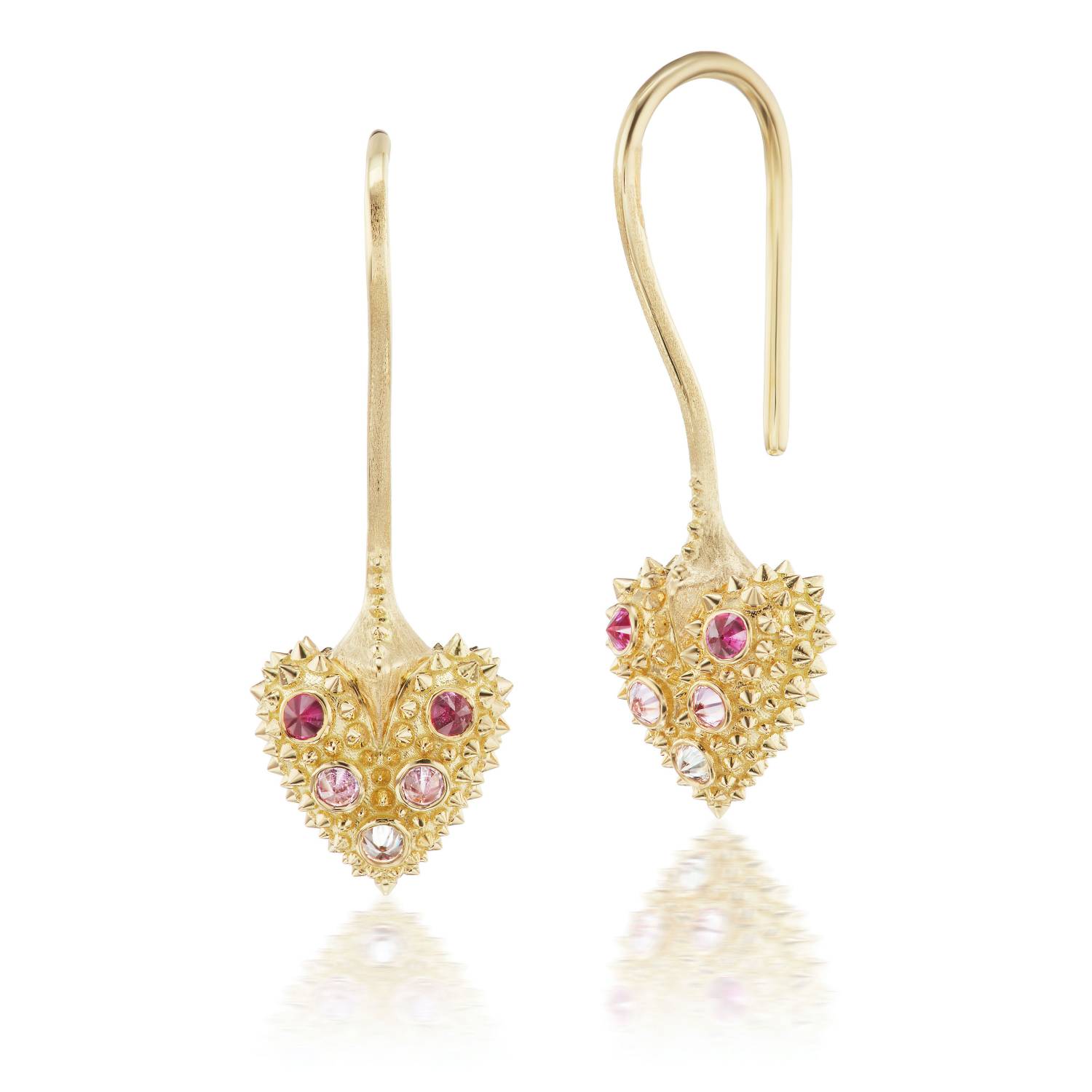 A front and side view of a pair of 18k yellow gold drop earrings in the shape of a heart with soft spikes & inverted pink sapphires in darker to lighter shades to give an ombre look - designed by Ana-Katarina Fine Jewelry. 