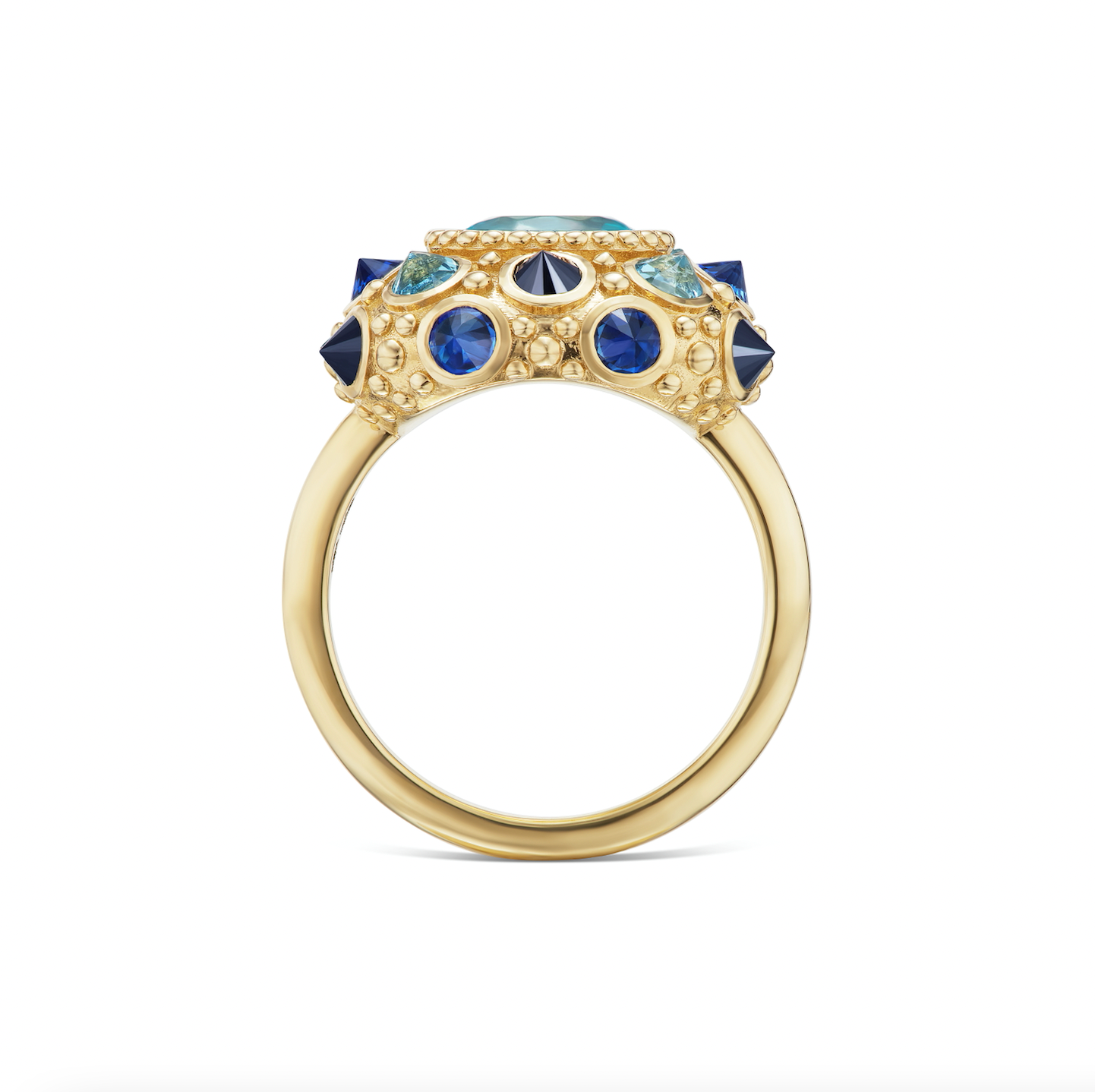 A full side view of this stunning ring crafted in 18k yellow gold, adorned with 1.18ct Apatite, .44ct Aqua, .73ct Blue Sapphire, and .75ct Black Diamond, featuring an exquisite design inspired by the delicate sea urchin. Engraved with 'LOVE' underneath.