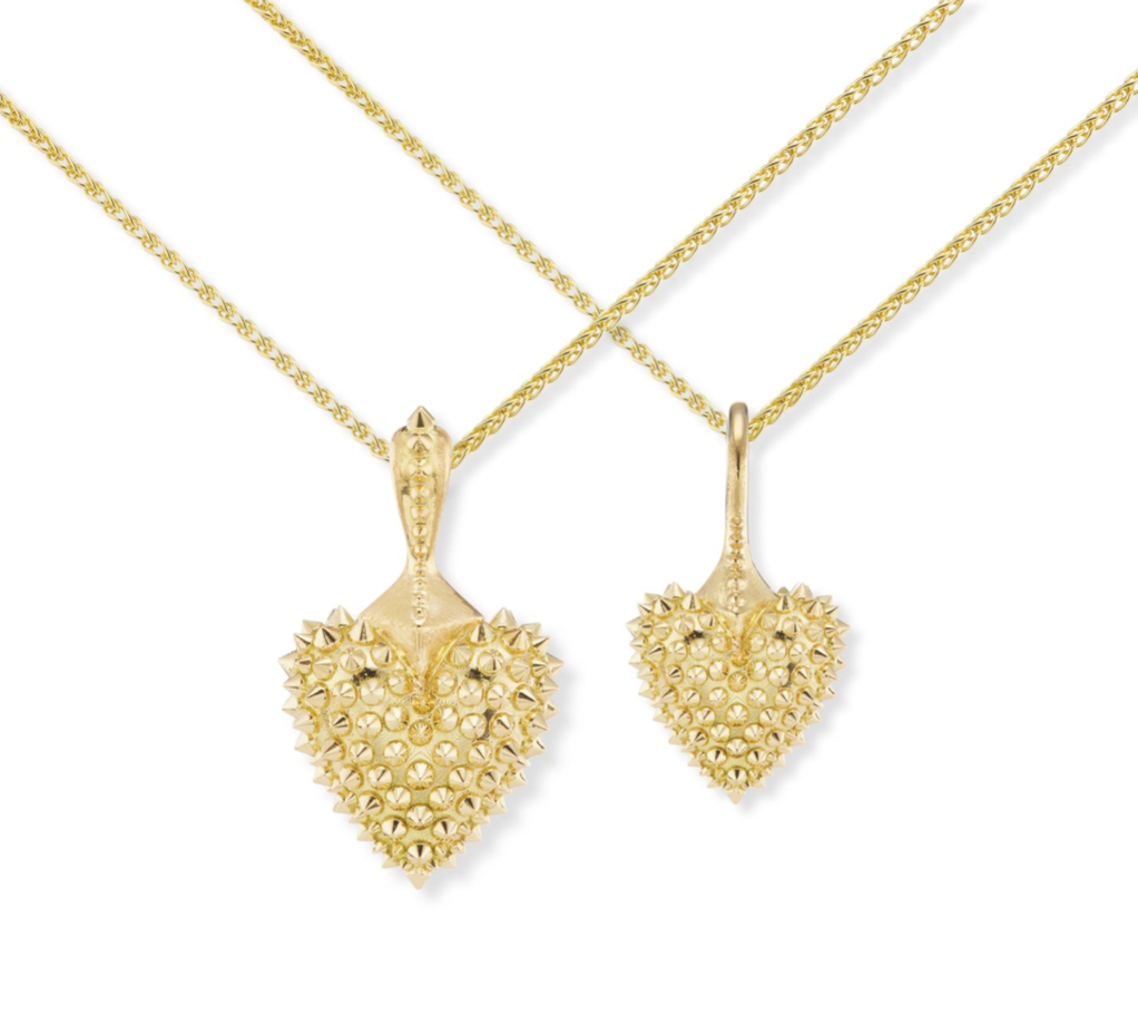 Two of Ana-Katarin’s 18k gold spiked heart necklaces on 18k yellow gold cable chains - the larger heart is the ‘Gold Heart Necklace’ from the ‘Pierce Your Heart’ collection. 
